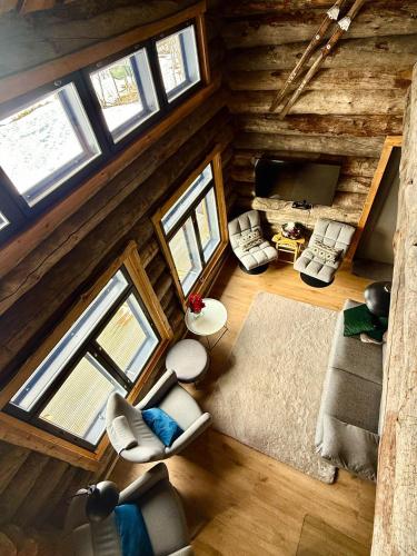 an overhead view of a living room in a log cabin at Villa Karhukumpu in Ivalo
