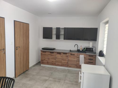 Dapur atau dapur kecil di Domki Tawerna Skulsk