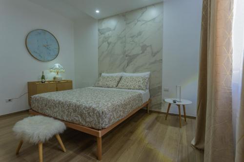 En eller flere senge i et værelse på Rooms 2,6