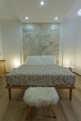 Ένα ή περισσότερα κρεβάτια σε δωμάτιο στο Rooms 2,6