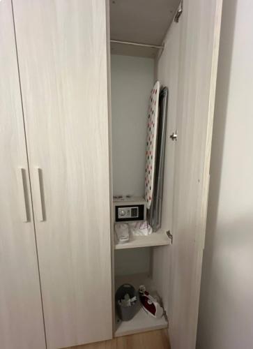 a small cabinet with a television in a room at Cecia's House in Bassano del Grappa