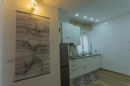 Η κουζίνα ή μικρή κουζίνα στο Rooms 2,6