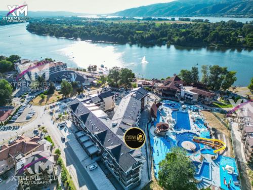 an overhead view of a resort with a river at Apartman Lakers in Ostrovo