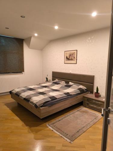 Ένα ή περισσότερα κρεβάτια σε δωμάτιο στο Penthouse Villa Ljubljana