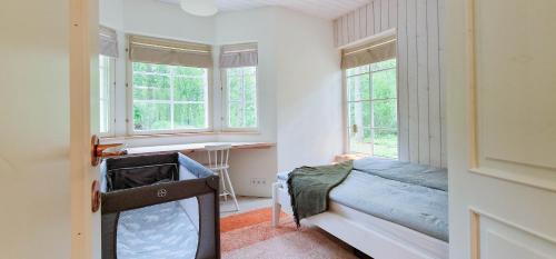 Cama o camas de una habitación en Meremaa Ateljee