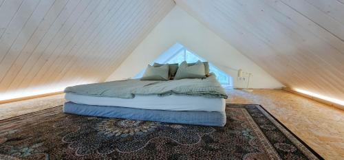 Cama o camas de una habitación en Meremaa Ateljee