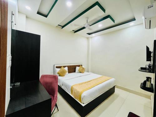 Postel nebo postele na pokoji v ubytování Hotel Astha Inn A luxury boutique Hotel