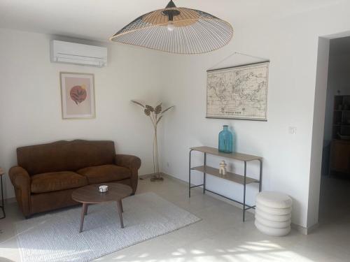 Posezení v ubytování Mini Villa avec Piscine Vue Mer