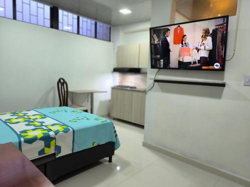 Una cocina o kitchenette en Cómodos y acogedores Apartaestudios - Manizales