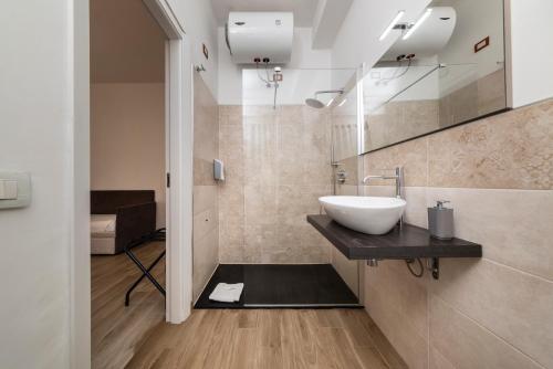 A bathroom at NG Guest House l'Acquedotto