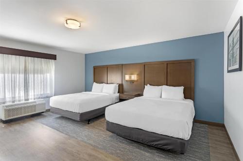 a hotel room with two beds and a window at Best Western Plus Hershey in Hershey