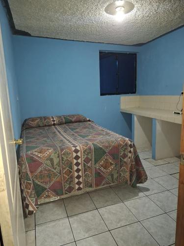 Hostal The New Shelterにあるベッド