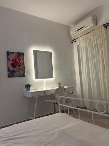 Ένα ή περισσότερα κρεβάτια σε δωμάτιο στο Elpida's comfortable house