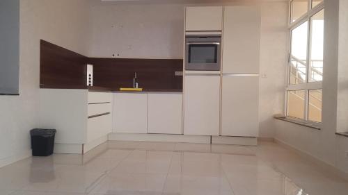 Cuisine ou kitchenette dans l'établissement Ajdir