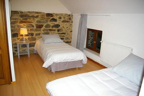 Katil atau katil-katil dalam bilik di Les Temps Gourmands