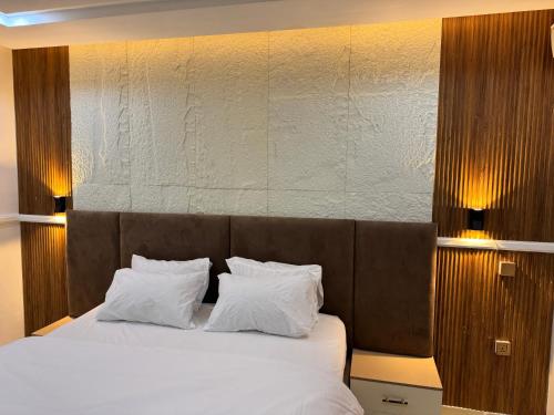 Ένα ή περισσότερα κρεβάτια σε δωμάτιο στο Cozy 2-Bedroom Apartment