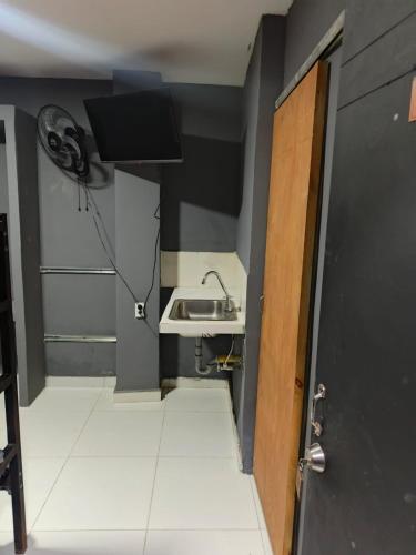 Ένα μπάνιο στο Dulce Hogar Aparta Hotel