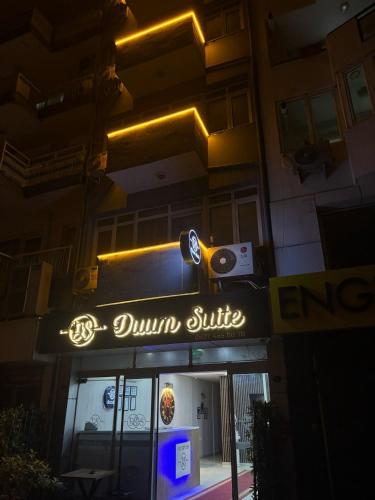 a dunkin butter sign on the front of a building at DUUM suite in Karşıyaka