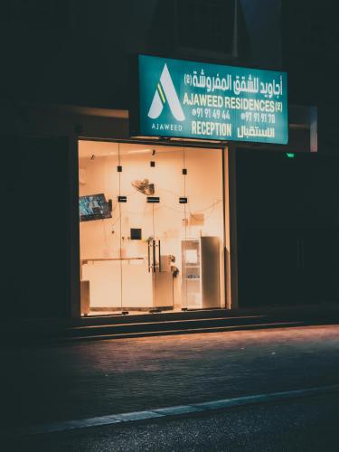 a window of a building with a sign on it at أجاويد 2 Ajaweed in Salalah