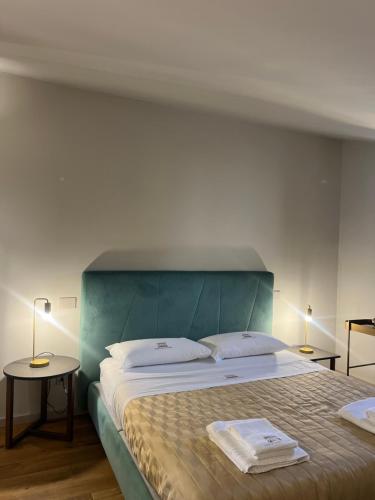 Postel nebo postele na pokoji v ubytování Atenea Palace Luxury Rooms - Atenea Collection