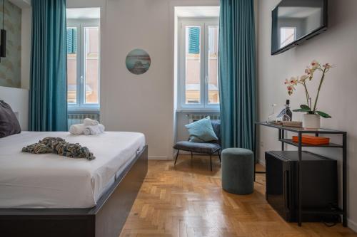 A bed or beds in a room at The Venue Spagna