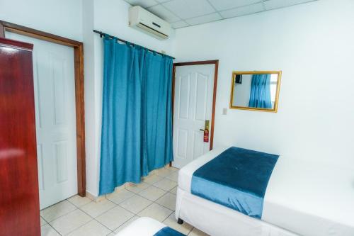 Cama o camas de una habitación en Aparthotel ROS