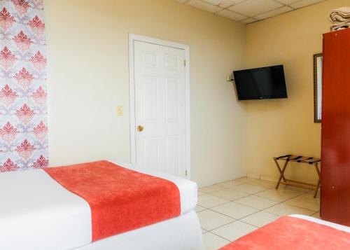 Cama o camas de una habitación en Aparthotel ROS