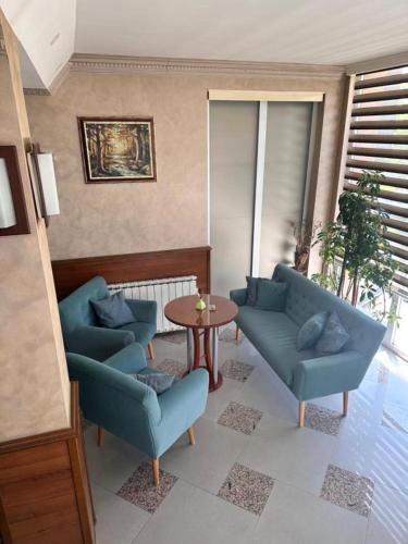 Posezení v ubytování Hotel New Milenium