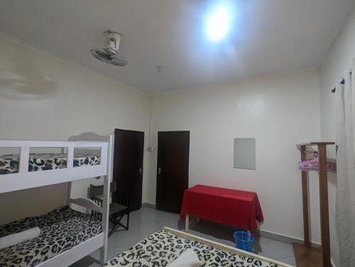 Кровать или кровати в номере JACARANDA HOMESTAY