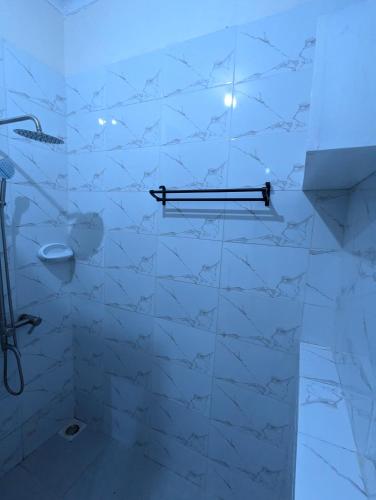 Ванная комната в JACARANDA HOMESTAY