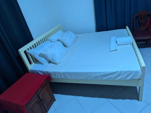 Кровать или кровати в номере JACARANDA HOMESTAY
