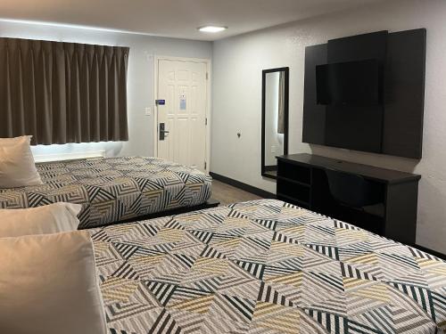 Postel nebo postele na pokoji v ubytování Motel 6 Seguin TX