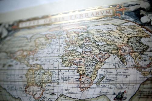 a map of the world with the words world treaty at Rezydencja Solei Old Town in Poznań