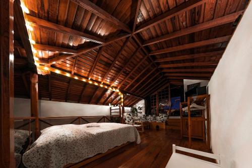 En eller flere senge i et værelse på Casa Papaya 1, La Palma