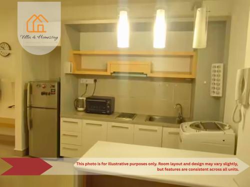 a kitchen with a stainless steel refrigerator and a sink at Cozy Studio unit,Cyberjaya,Wifi, Netflix,Free parking in Cyberjaya