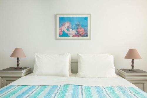 Ένα ή περισσότερα κρεβάτια σε δωμάτιο στο Acres Sunset Residence