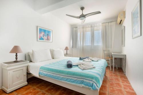 Ένα ή περισσότερα κρεβάτια σε δωμάτιο στο Acres Sunset Residence