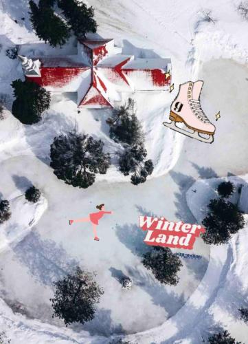 an overhead view of a snow covered yard with a skier and a building at Le Tiny loft ski in ski out in Mont-Tremblant