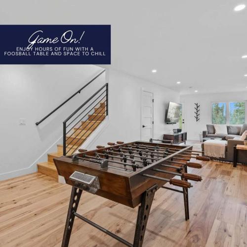 a large foosball table in a living room at Skyview in Fraser