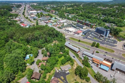 an aerial view of a town with a train station at Location Smokies Log Cabin Hot Tub Fireplace in Pigeon Forge