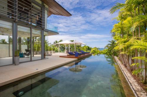 an external view of a villa with a swimming pool at Sava Ocean View Villas in Natai Beach