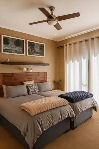 Ένα ή περισσότερα κρεβάτια σε δωμάτιο στο Lagoon Step Self catering Unit