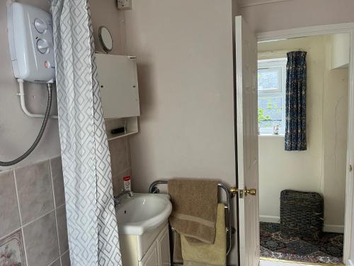 Et badeværelse på Maureen's Cottage