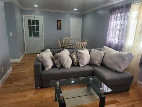 a living room with a couch and a table at Rosedale Home in Rosedale
