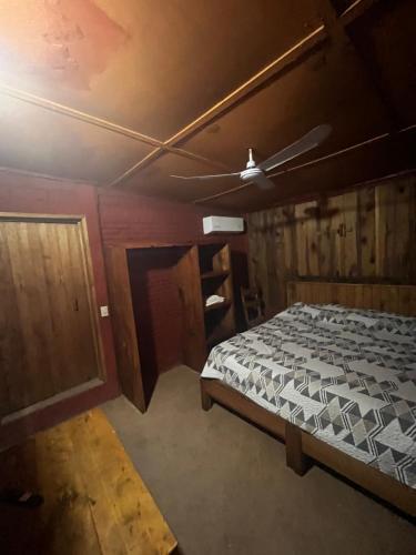 Postel nebo postele na pokoji v ubytování Cabañas LOS REYES