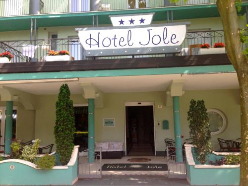 a hotel building with a hotel joke sign on it at Hotel Jole in San Mauro a Mare