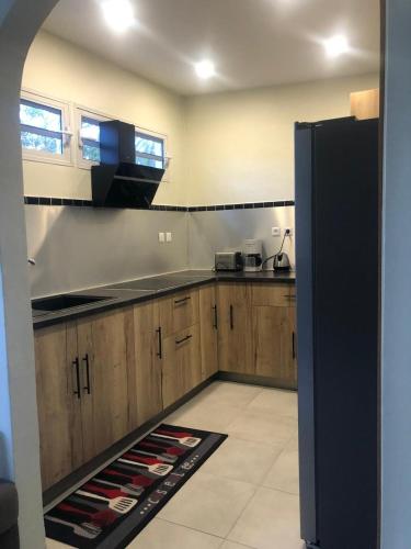 Η κουζίνα ή μικρή κουζίνα στο Paisible et confortable pour vous