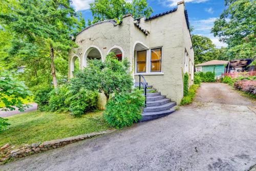 a stone house with stairs in front of it at Family and Pet friendly Charming Cozy Casita in Birmingham