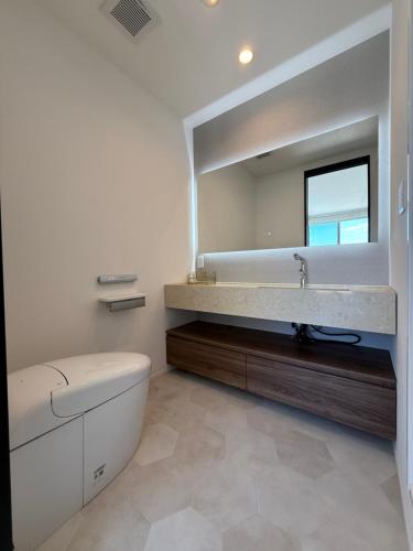 Un baño de 御宿ガーデンヴィラ