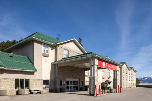a hotel with a horse in front of it at Ramada Golden in Golden
